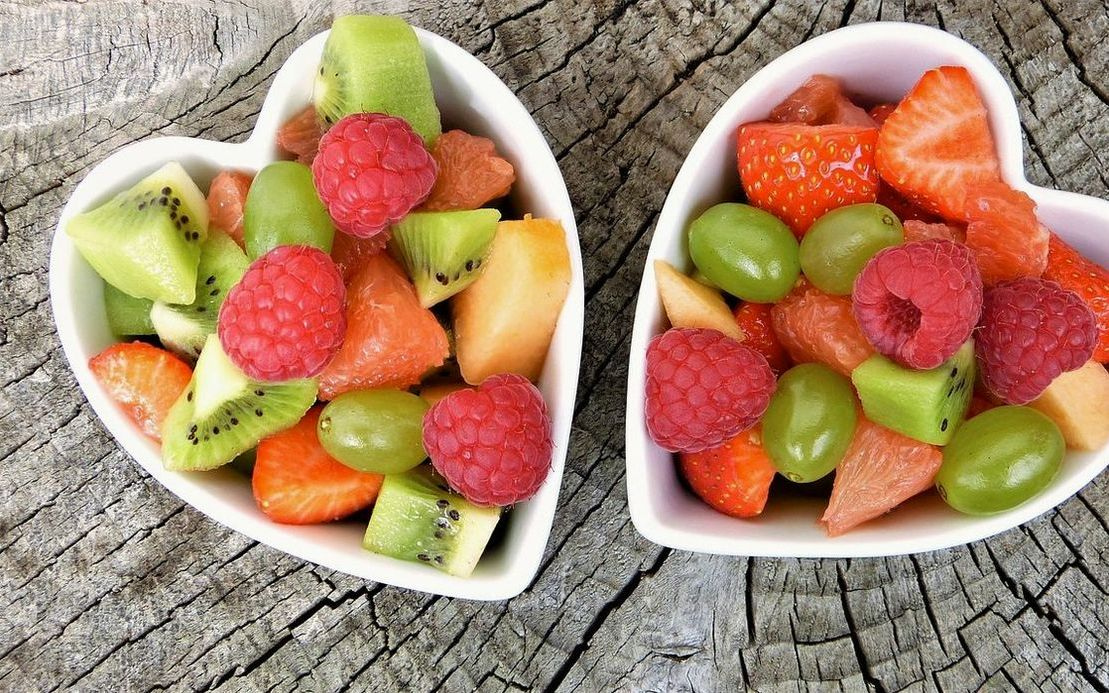 Ripe watermelon and fresh berries ready for delivery